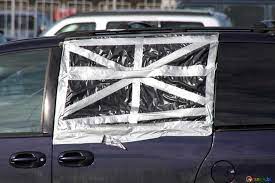 how to cover a broken car window safely
