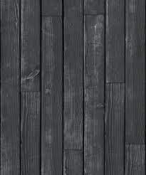 Each floorboard is designed to appear distressed for that perfect reclaimed look. Black Wooden Boards Wallpaper Timber Panelling Milton King