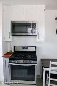 Use your kitchen cabinet tops as a space to stash things you have no room for elsewhere, like picnic baskets, decorative objects, or extra cutting boards. Installing An Over The Range Microwave