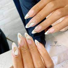 16 white and gold nails perfect for any