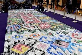 giant carpet of bottle caps celebrates