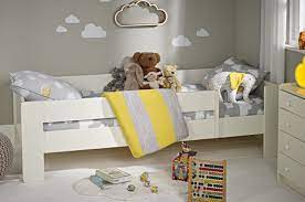 Child Move From A Cot To A Bed