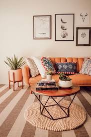 38 ways to incorporate an orange sofa