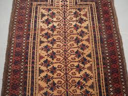 antique baluch camel ground prayer rug