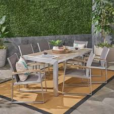Its lightweight construction makes it ideal for homeowners who are on the move regularly or just like to rearrange their patio furniture. Dining Sets Overstock Com Buy Patio Furniture Online Outdoor Dining Set Patio Furniture Deals Outdoor Dining