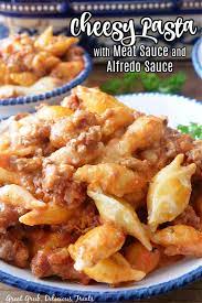 cheesy pasta with meat sauce and