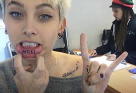 8 celebs with lip tattoos