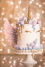 Easy unicorn cake tutorial with a shiny gold unicorn horn, piped buttercream hair and easy sparkly eyes! The 10 Most Magical Unicorn Cake Ideas On Pinterest Shimmer Confetti