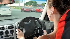using earbuds while driving in