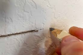 Patch A Hole In Drywall Repairing