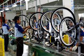 Exploring indonesia by bicycle indonesia is a sprawling island archipelago, stretching from the indian ocean to the west and the pacific ocean in the east. Workers Check On The Assembly Line At The Assembly Bicycle Bike Stock Photo Picture And Royalty Free Image Image 42010900