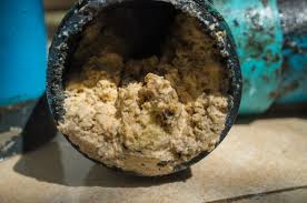 what causes main sewer line clogs