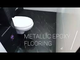 metallic epoxy toilet floor resurfacing