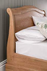 Carmen Oak Sleigh Bed With Storage