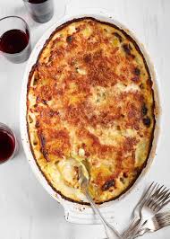 Looking for an impressive side dish for this holiday season? Potatoes Au Gratin Recipe