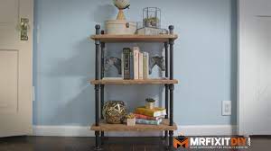 The industrial shelf was 24 long and standard studs on walls are about 18 apart. Diy Industrial Pipe Book Shelf Youtube