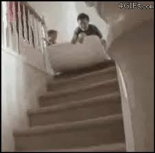 fail fun kid ride falling down stairs