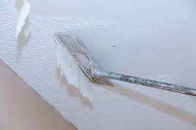 how to use a popcorn ceiling removal tool