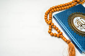 al quran and rosary beads or tasbih