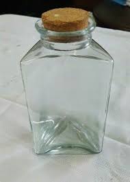 vintage glass bottle triangle shaped
