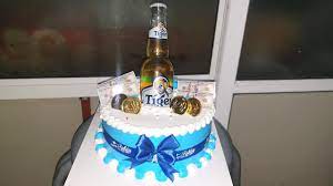Be warned that the beer can cake will be very heavy, that's 30 cans of brew on there! Birthday Cake For Men Place A Tiger Beer Youtube