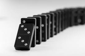 Image result for first domino to fall