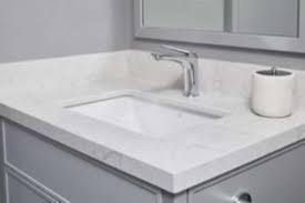 The only all white countertop i'm aware of is a formica top or a corian type top. What Are The Pros And Cons Of Quartz And Cultured Marble Countertops Custom Home Builders Schumacher Homes