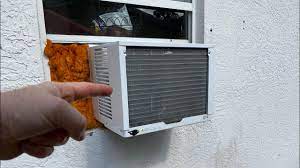 to clean a really dirty window ac unit