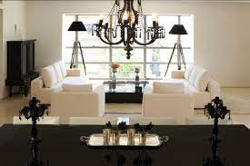 living room with tripod lamps