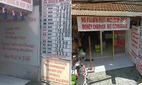 Calculate exchange rate money value of sgd vs myr. Hilarious Sign For Money Changing Machine In Bali Promises No Rip Off For Customers Daily Mail Online