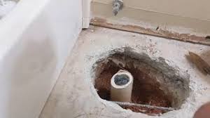 move toilet waste pipe in concrete slab