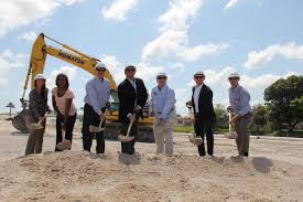 13th floor homes breaks ground and