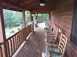 Beautiful views of the nearby mountains are visible from the wrap around porch. Adventurewood Log Cabin Luxury Lodging At Its Finest Brown County Indiana