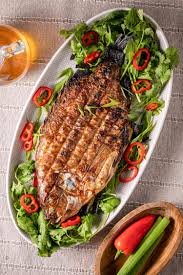 grilled whole fish stuffed with herbs