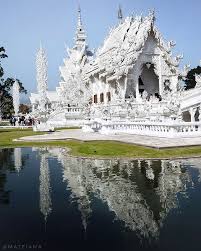Picturesque collection of white chedis. How To Spend A Perfect Day In Chiang Rai Top Things To Do In Chiang Rai