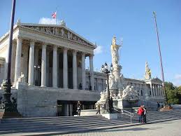 Borrowed from late latin parlamentum. Vienna Parliament Building Pallas Athene Statue