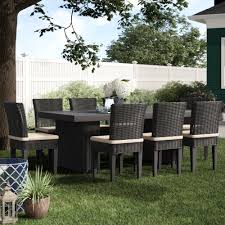 Outdoor dining sets are available in large kits that include an entire ensemble — chairs, tables, umbrella, and more. Olathe 9 Piece Outdoor Patio Dining Set Reviews Birch Lane