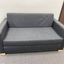reserved small couch opens into bed