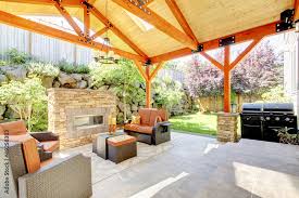 Exterior Covered Patio With Fireplace