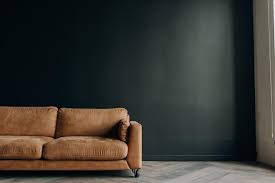 Brown Sofa On A Dark Gray Wall