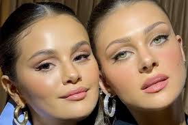 nicola peltz beckham twin in glowing makeup