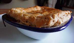 suet crust topped minced beef and onion pie