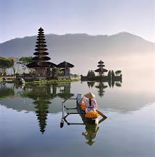 Ringed by a mountain backdrop and surrounded by . Bali Pura Ulun Danu Bratan Temple By Martin Puddy