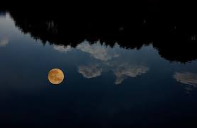 The Full Moon Reflected On The Lake Surface Stock Photo - Download Image  Now - iStock