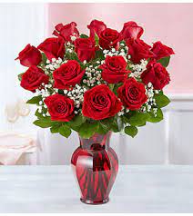 red rose eigh in red vase send to