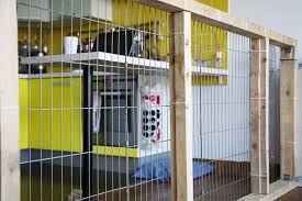 how to build a dog kennel pen indoors