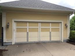 repairing damaged garage door panels in