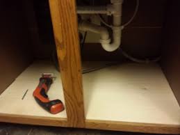 wood floor under the kitchen sink