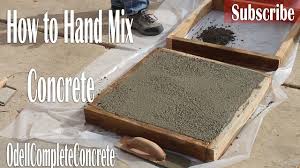 hand mix concrete with rock sand cement