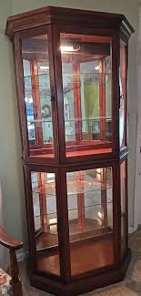 beautiful amish angled curio cabinet